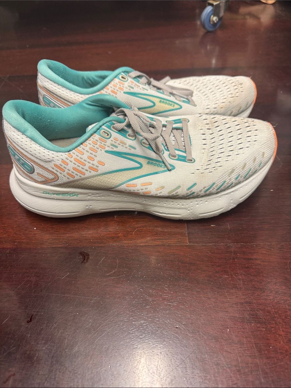 Brooks Women’s White Running Shoes with Teal and Orange Accents
